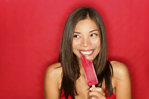 Girl eating popsicle